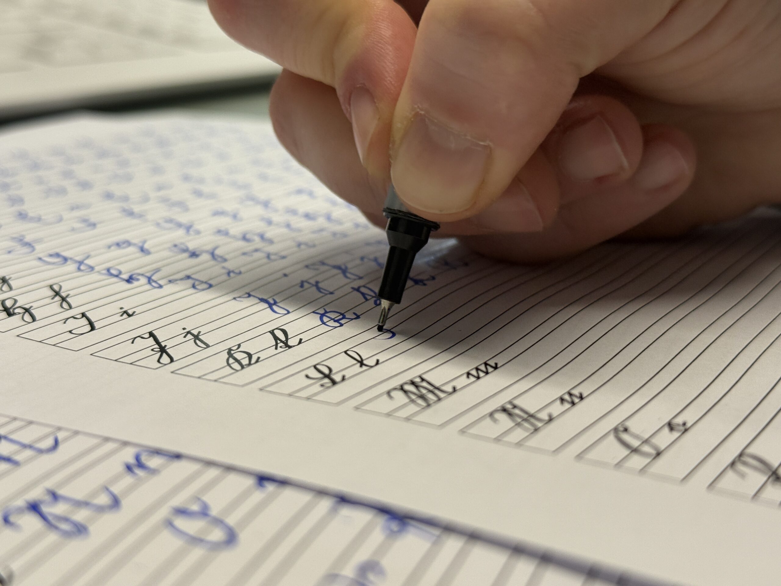 A hand writing script